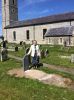 Evans Descendant beside Headstone for William & Sarah Evans 